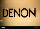 Denon logo on a golden background.