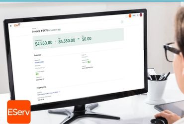Person using EServ software on a computer to view an invoice.