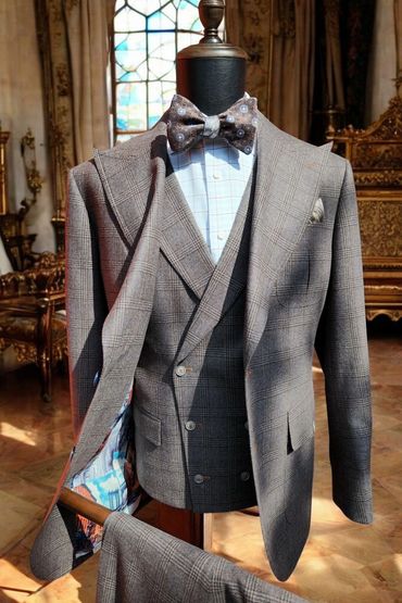 Single-breasted grace meets precision tailoring in this Glen plaid stunner—style, and flair.