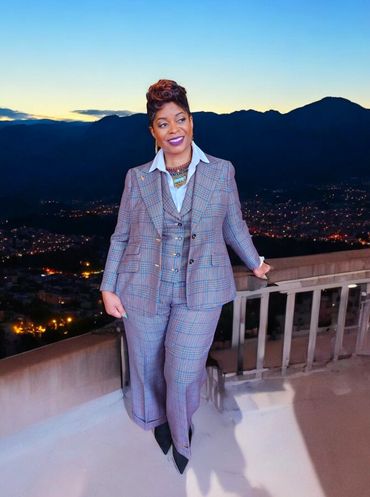 Three-piece plaid bespoke suit with wide-leg pants, tailored fit, and sharp peak lapels for timeless