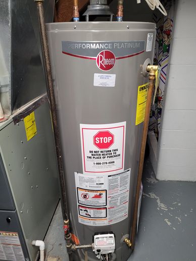 Rheem Performance Platinum water heater with warning labels and energy guide. Omaha plumber
Plumber