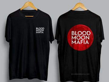 Black 'Blood Moon Mafia' rock band t-shirts on hangers.