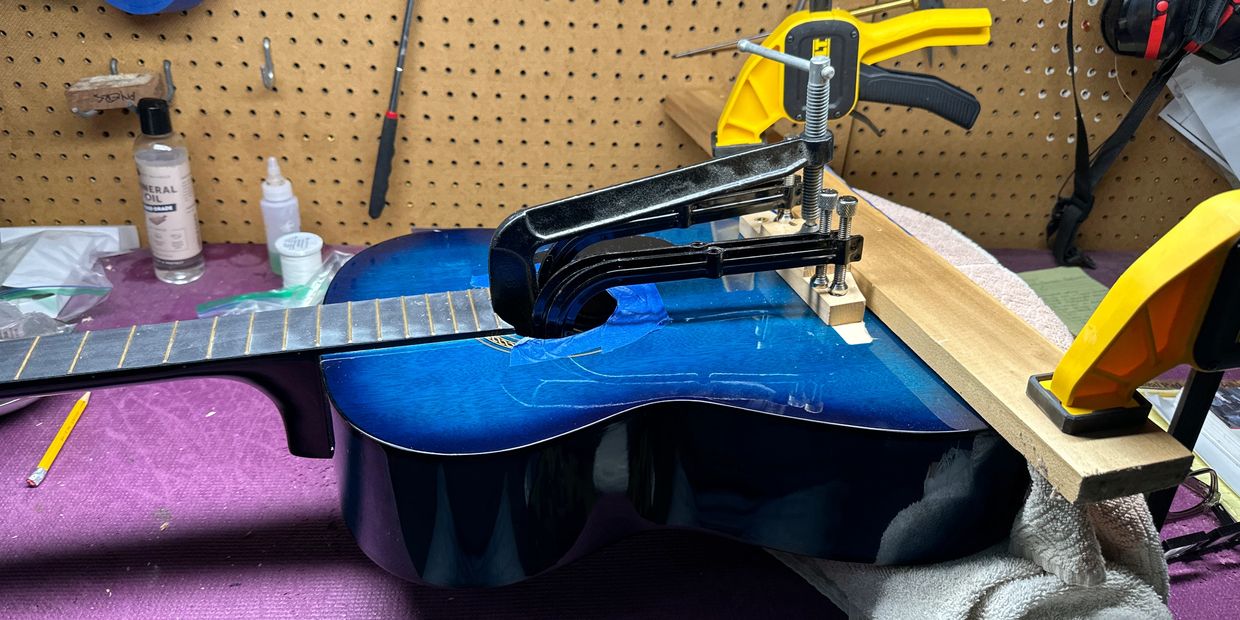 Regluing a loose bridge to an acoustic guitar