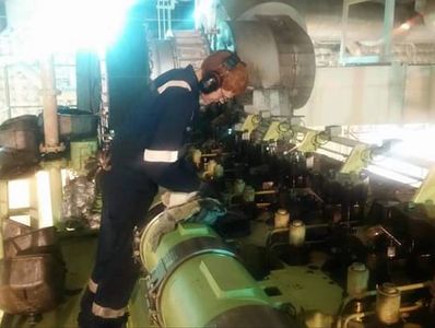 Robert Thurlow owner of Crofts and lochs engineering and contracting, doing tappet clearance checks 