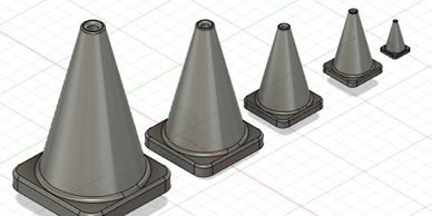Cinq cônes de circulation en 3D de différentes tailles.