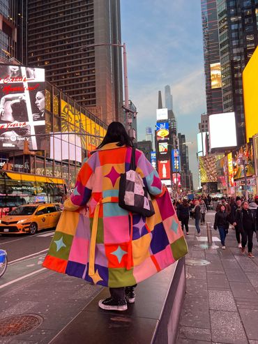 Rainbow star coat during New York Fashion Week in Times Square 