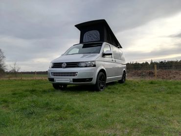 VW Transporter with Westdubs poptop scenic canvas