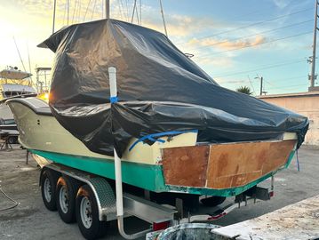 cosmetic damage being repaired at a local boat yard. 