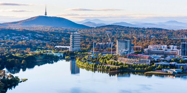 An aerial image of Canberra in the Australian Capital Territory (ACT) overlooking the lake and city.