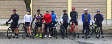 SIKLLISTAS Cycling Collective - Group shot across the street from Blacksmith Bakery