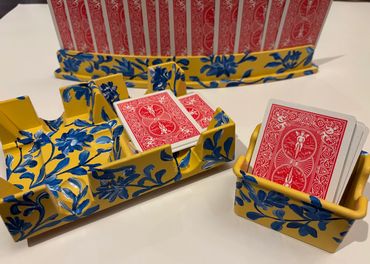 I hand paint and seal all the sets.
All 3 piece sets include 1 playing card rack, 1 revolving deck s