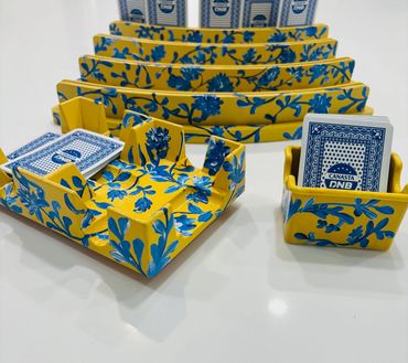 All 6 piece sets include 4 playing card racks, 1 revolving deck spinner and one extra card holder.