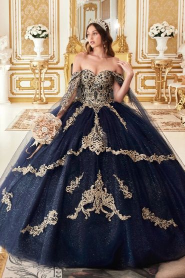Woman in an elegant navy blue ball gown with gold embroidery.