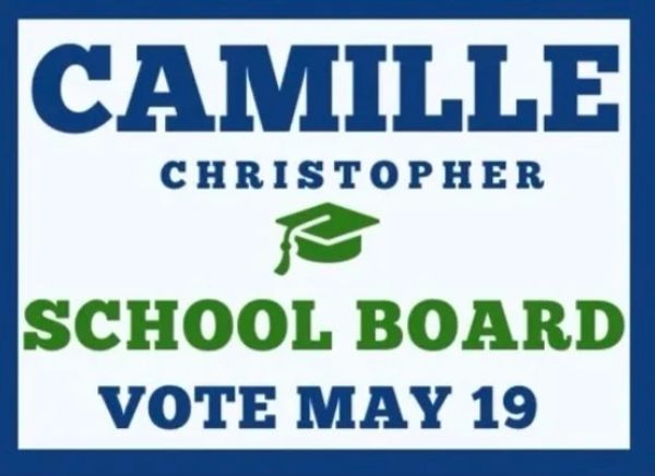Campaign sign for Camille Christopher running for school board, voting on May 19.