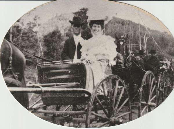 Couple in a horse buggy in the 1800s