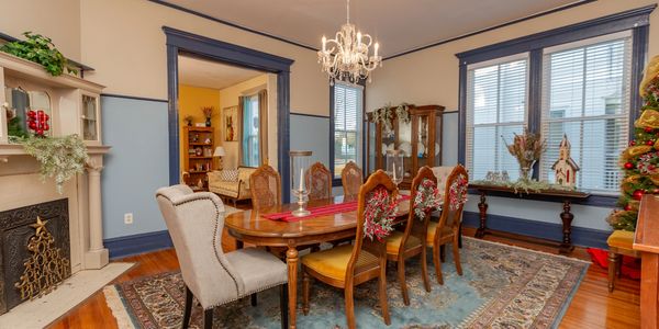 Dining room located next to the parlor and kitchen. 