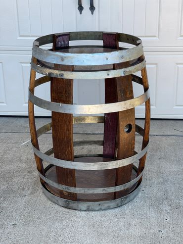 Barrel Table with two barrel heads, barrel rings, and partial staves.