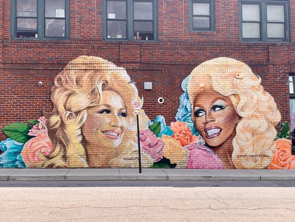 West Asheville Mural from artist, Gus Cutty. Dolly Parton and RuPaul.