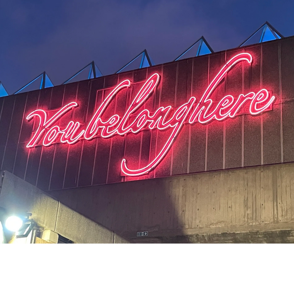 A sign that says “You belong here”, taken by Jenny in London.