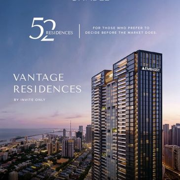 Modern high-rise residential towers at sunset in a cityscape.