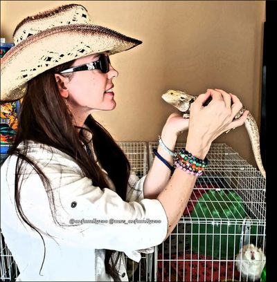 Mrs. Zoo holding a lizard