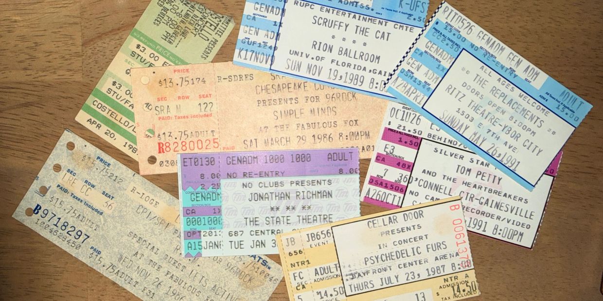 A collection of vintage concert tickets from the 1980s and 1990s.