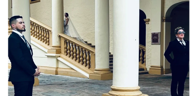 Protecting the Bride & Groom during photoshoot. 