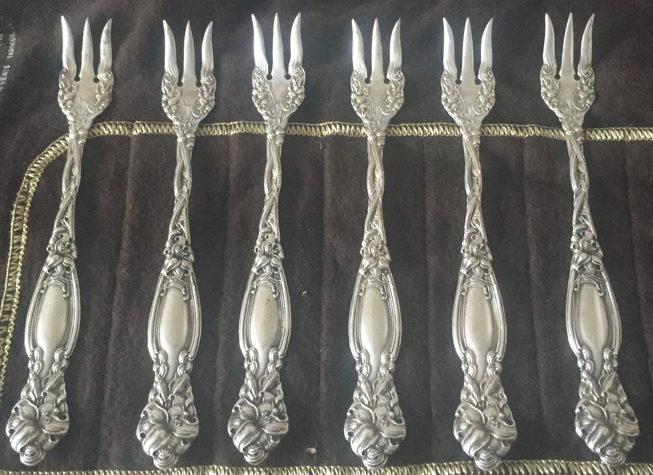 The beauty of a little silver polish on 100 year old silverware! :  r/restoration