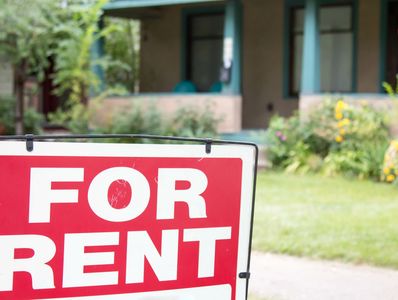 For rent sign in front of an Albuquerque Home for rent. 