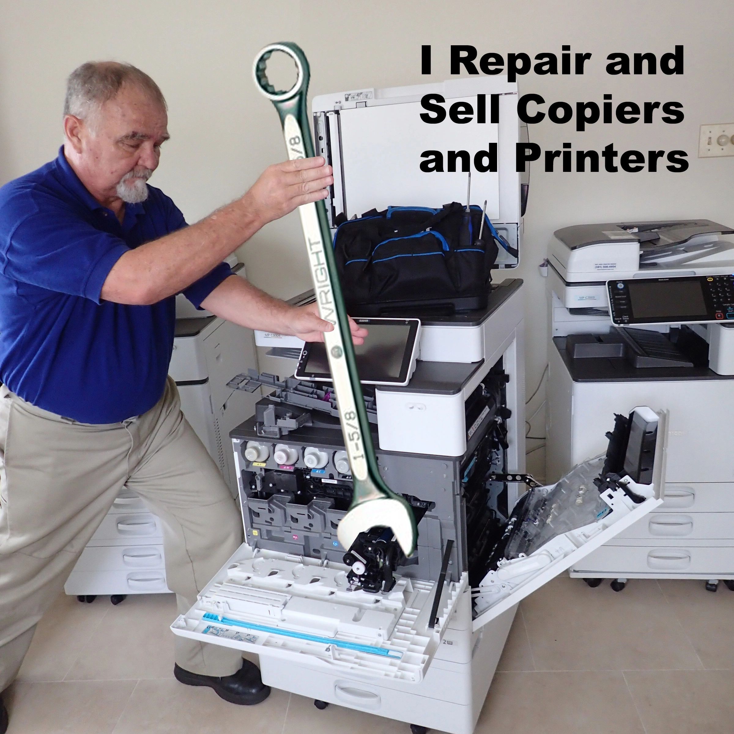 technician repairing a copier with an oversized wrench