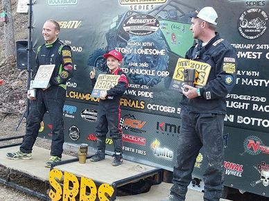8-year-old Cash on the first-place podium for his first win at the SRRS race series.