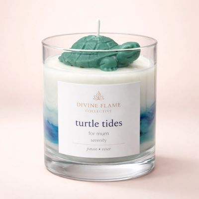 Scented candle with a turtle-shaped wick in a clear glass container.