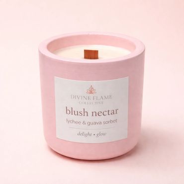 Pink Divine Flame Collective candle labeled blush nectar with lychee and guava sorbet scent.