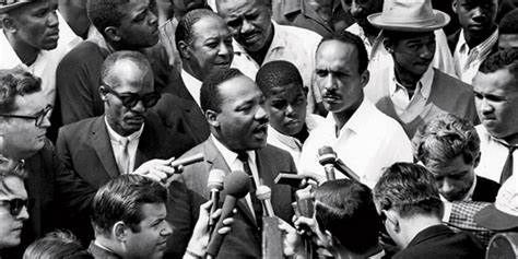 Martin Luther King and Al Raby (in white shirt to right of King)