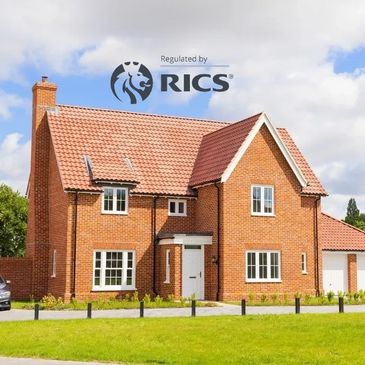 Modern brick house with a red tiled roof and a driveway.