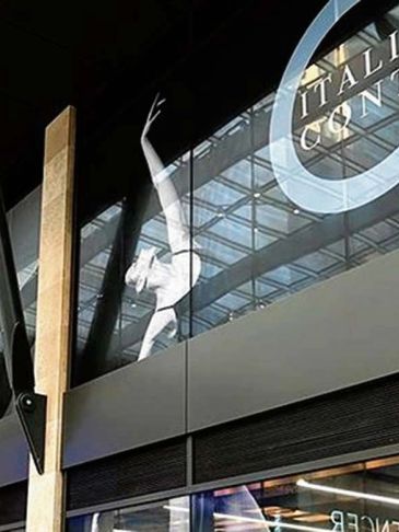 Window shows a silhouette of a dancer in motion.