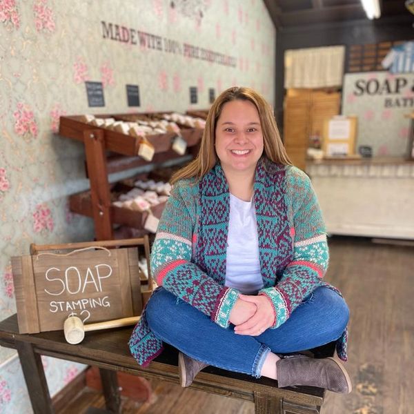 Denise Strasberg, the owner of Soap & Oils  Bath Co and UNCHAPPED in her store