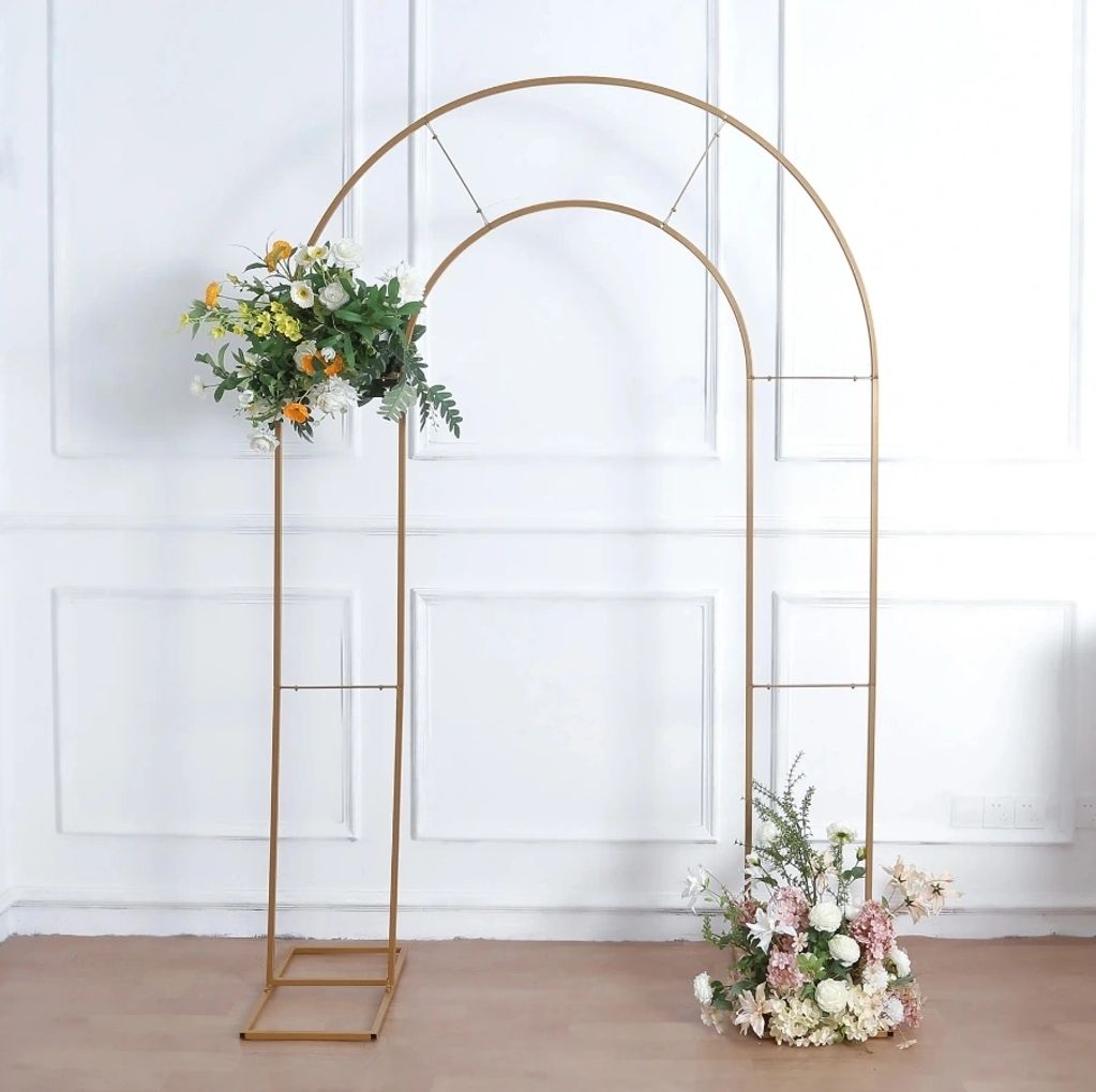 8 ft open gold arch. $100 rental with balloon service 