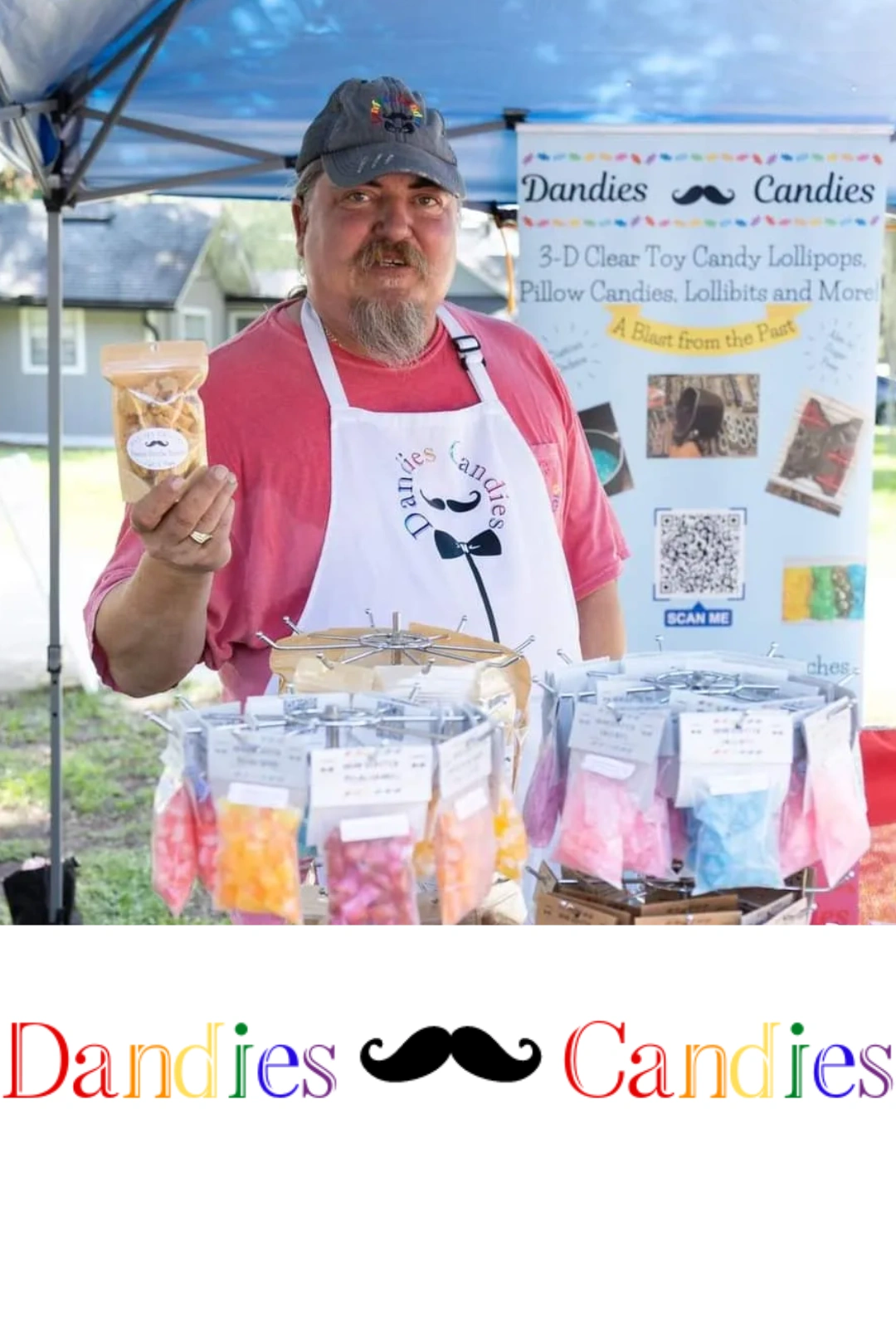 Dan Cote displaying a bag of brittle to sell along with pillow candies and rock candies