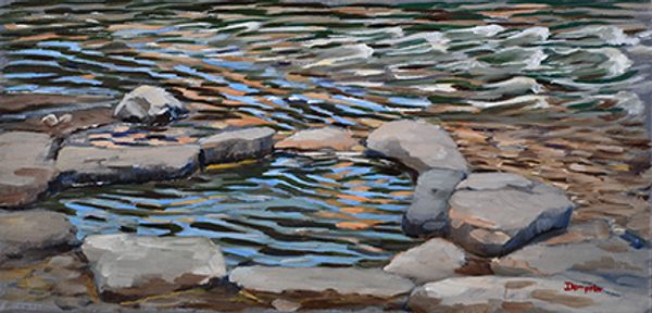The Burg hot spring pool at The Springs Resort, situated on the edge of a fall in the San Juan River