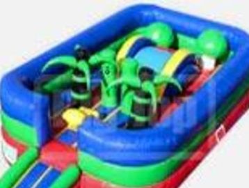 Colorful inflatable obstacle course with palm tree designs.