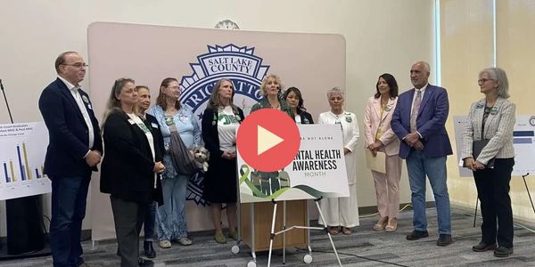 Group of people at Salt Lake County event for Mental Health Awareness Month.