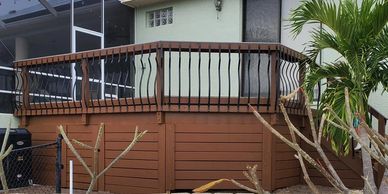 brown deck with wire handrail