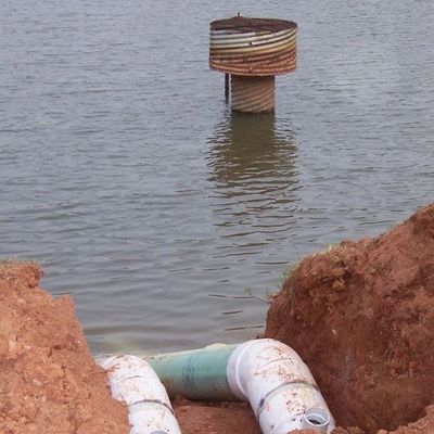 siphon system installation, dam repair, dam leak, pond pipe repair