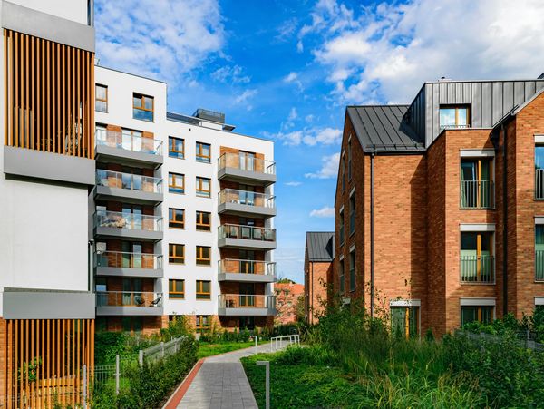Modern multi-story apartment buildings.