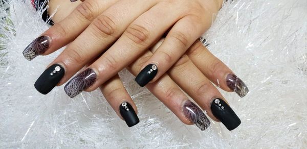 Client loved her black nails marching with her dress 