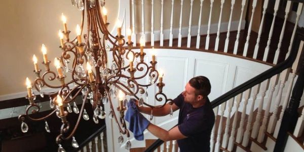 Heavy chandeliers, light fixtures, and ceiling fans installed by electrician