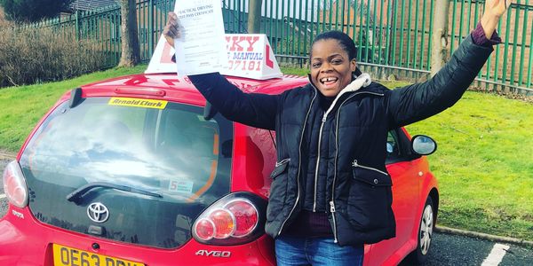 Joy of passing driving test.