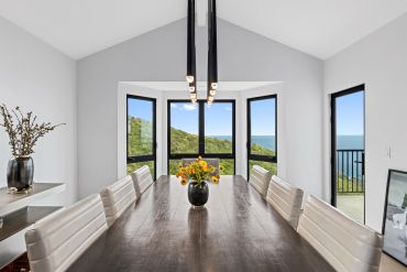 Modern dining room with ocean view.