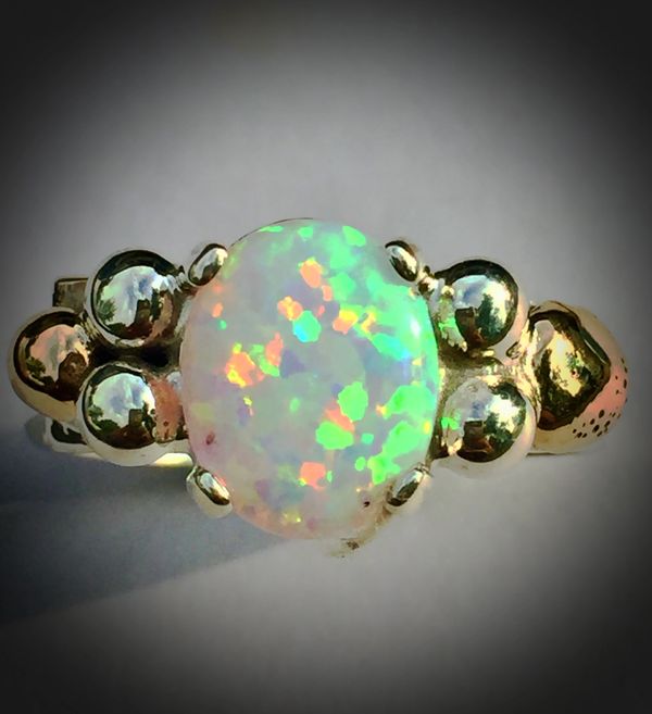 great opal in sterling and 14k gold setting 295.00 subject to discount on web site here